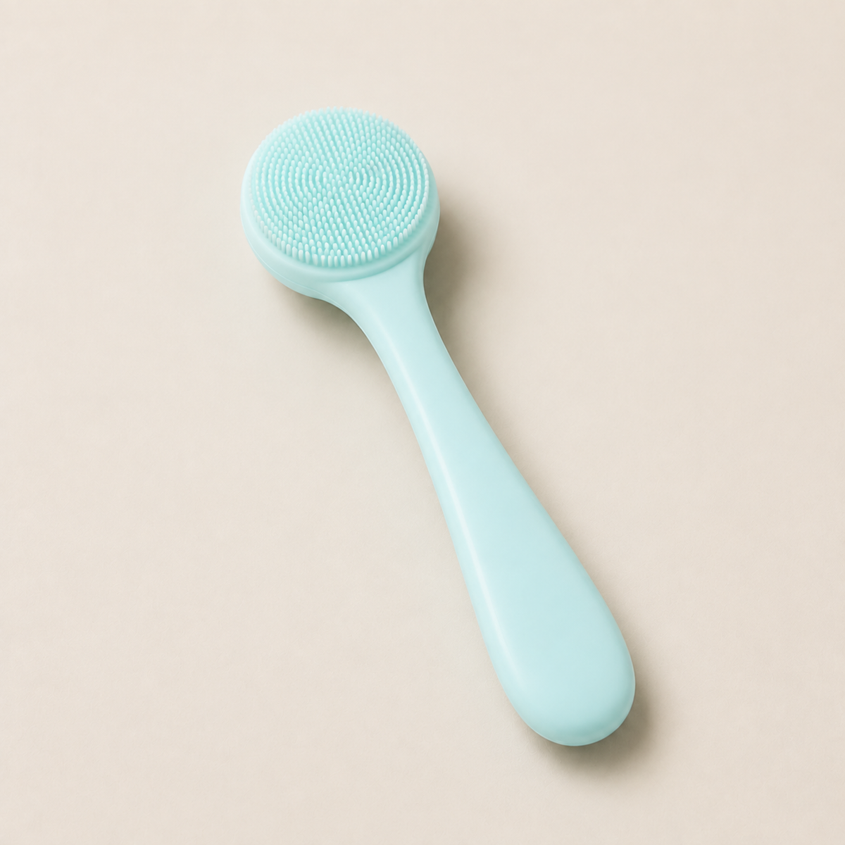 Mint silicone facial cleansing brush, bristle side up