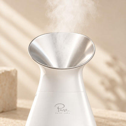 Facial steamer releasing steam in a bright spa setting – thumbnail